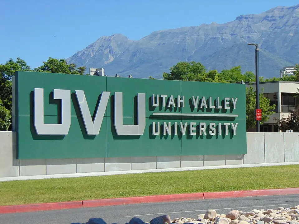 The Utah Valley University sign on the Orem campus with the Wasatch Range behind it